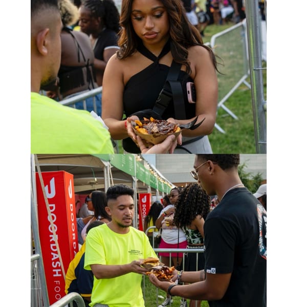 Two people exchanging Supreme Barbecue's loaded fries and a burger at an outdoor event.
